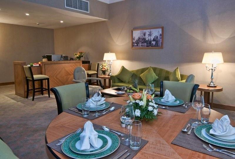 Wiseman Grand Hotel Doha Inreriör bild A suite at the hotel