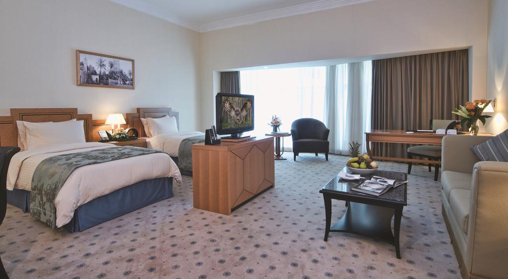 Wiseman Grand Hotel Doha Exteriör bild A room at the hotel